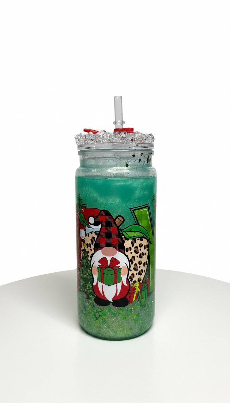 Tumbler with festive design featuring a reindeer, gift, and leopard print on a white background